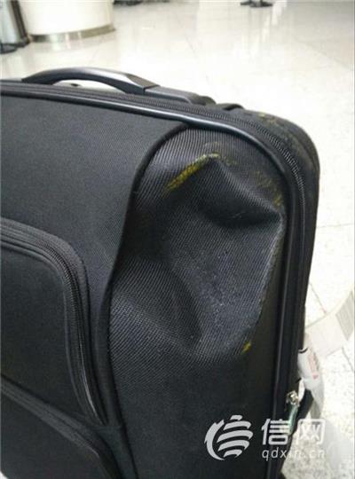 黄先生的行李箱被摔坏 野蛮装卸损坏行李箱 东方航空:无发票赔偿少